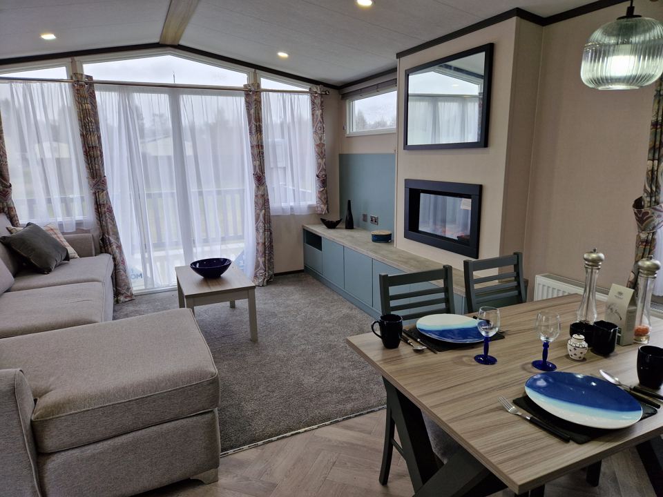 Lounge with fire and dining table