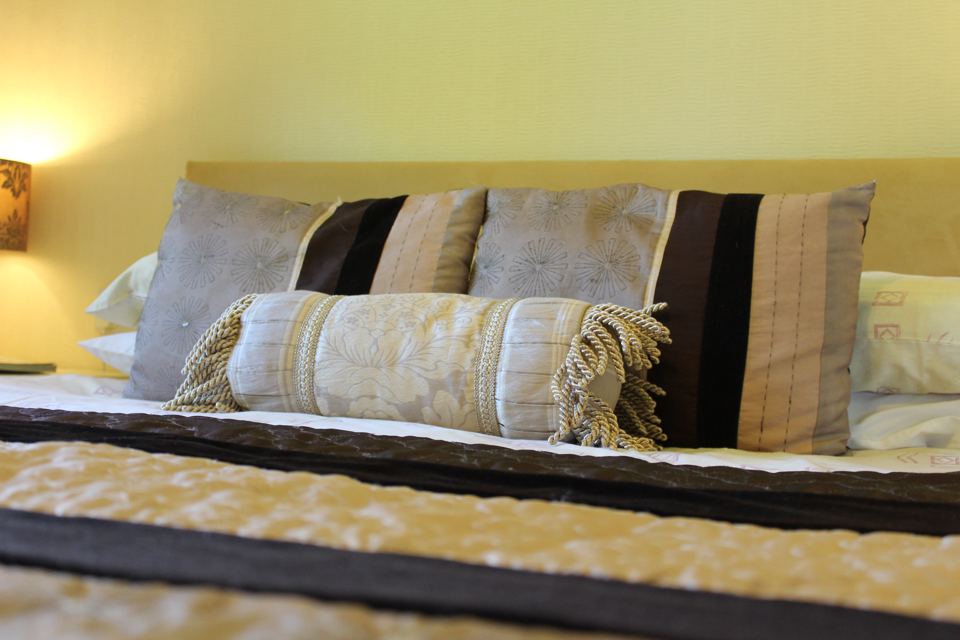 Bed with cushions