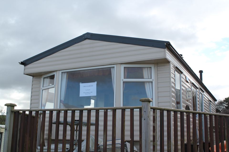 Static caravan with decking