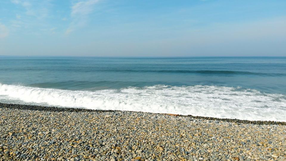Pebble bank and surf