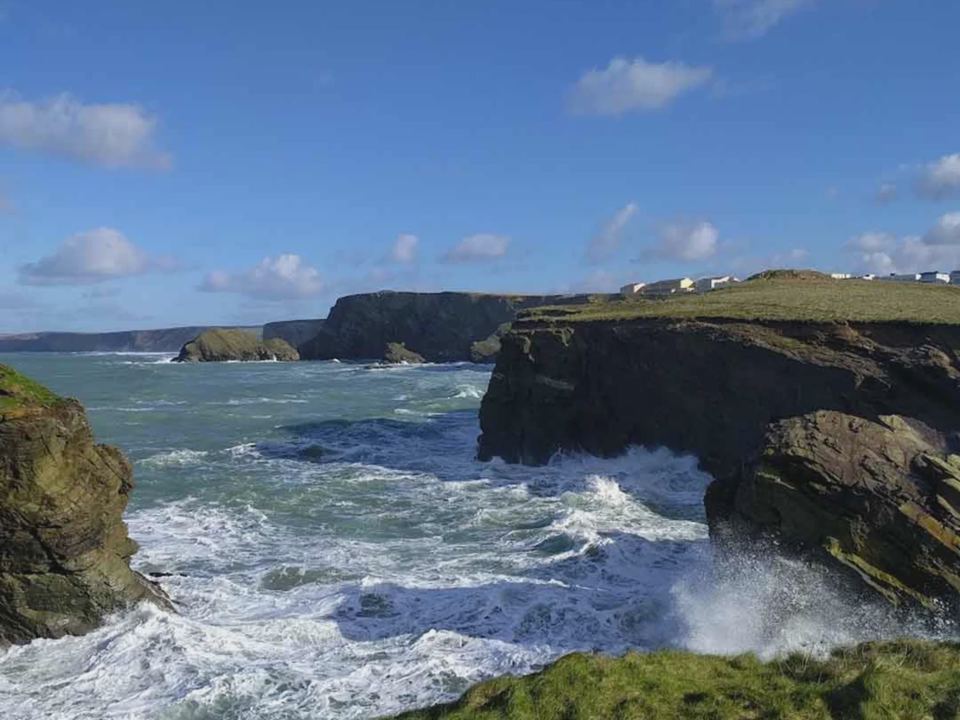 Cliffs and surf below the headland