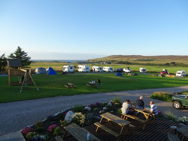 Tents and motorhomes on the grass