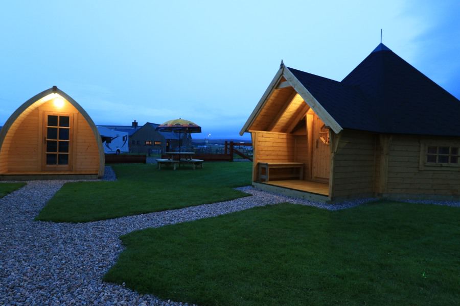 Glamping pods at dusk