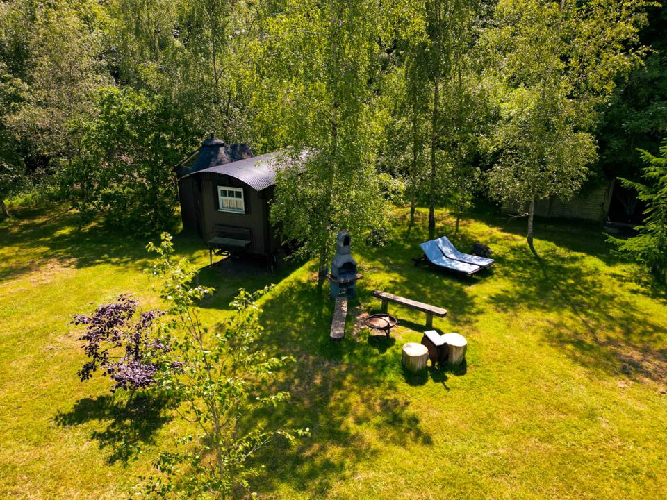 Hut and lawn from above