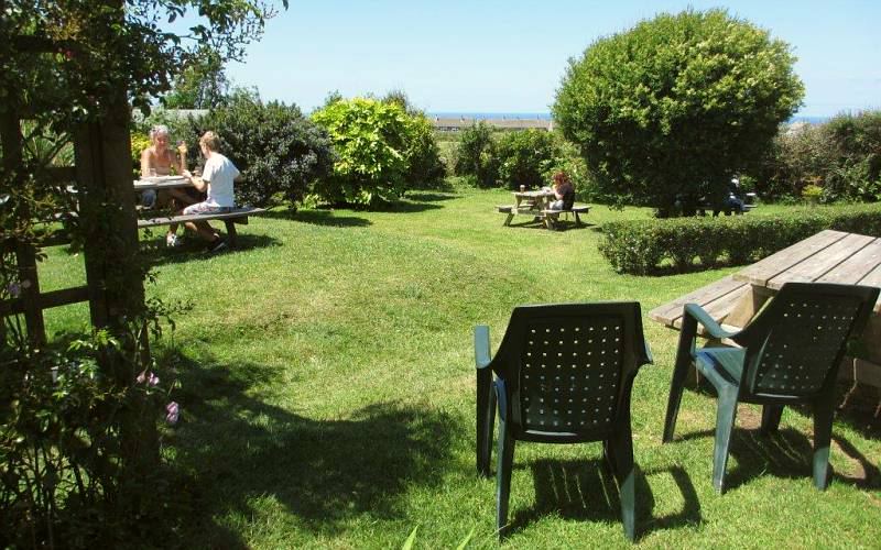 Lawned garden with picnic tables