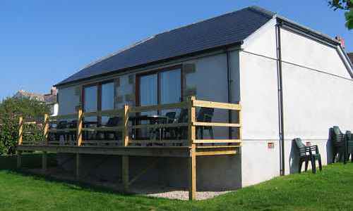 Building with decking and seating