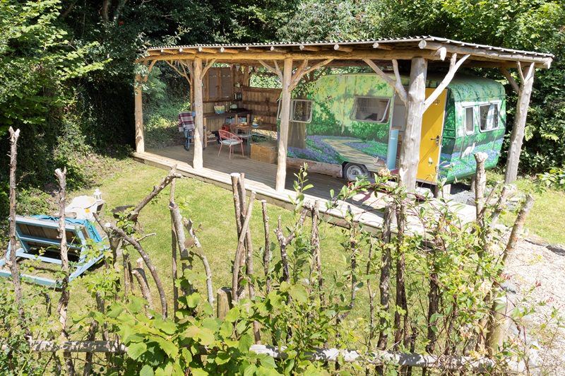 Vintage caravan under a canopy