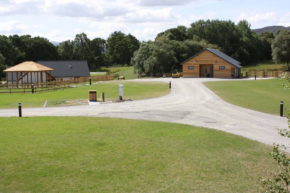 Grassed site and service buildings