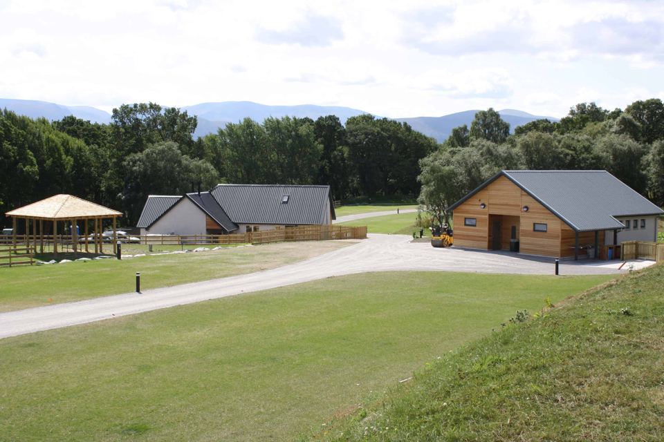 Park buildings and hills beyond