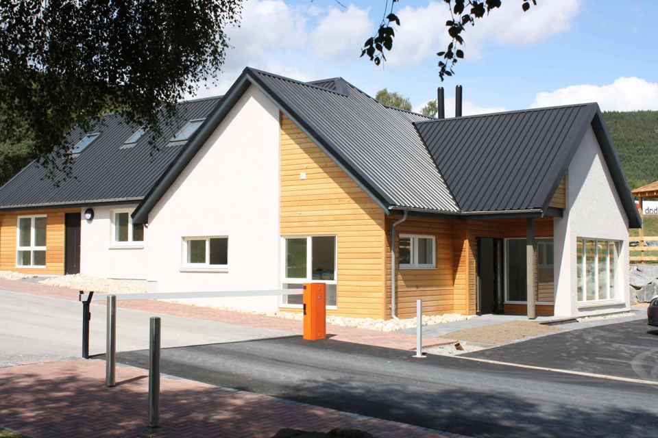 Reception building and barrier
