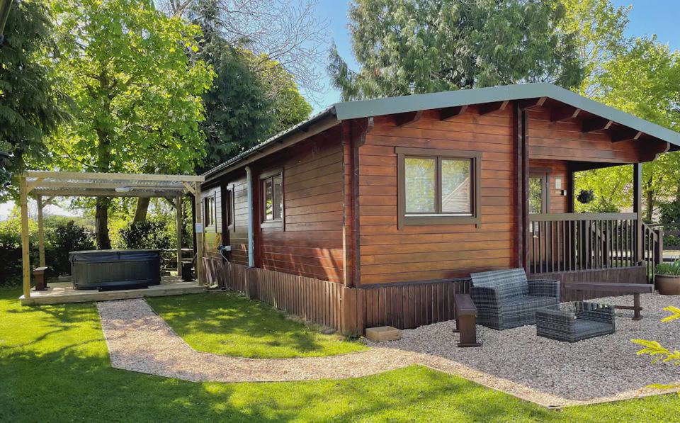 Wooden lodge with hot tub