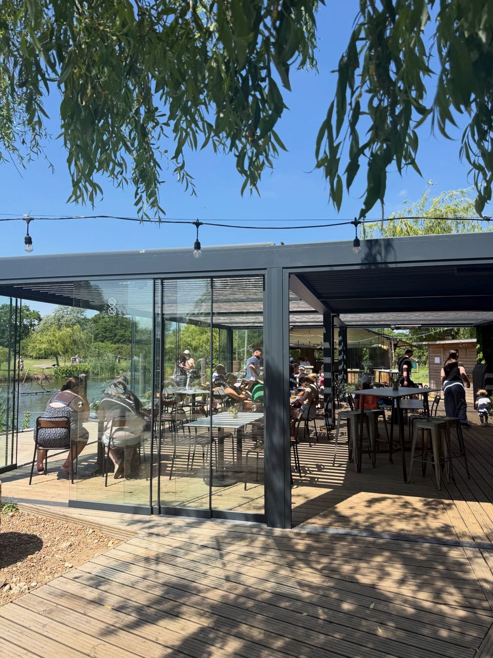 Glass-fronted cafe by the lake