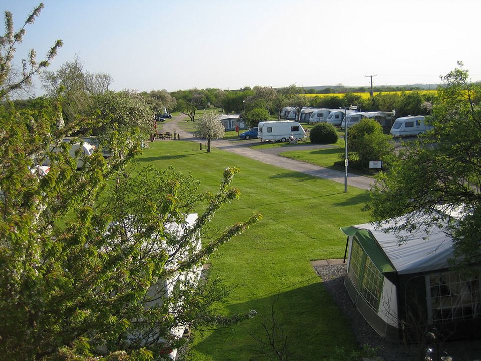 Touring pitches across the grass