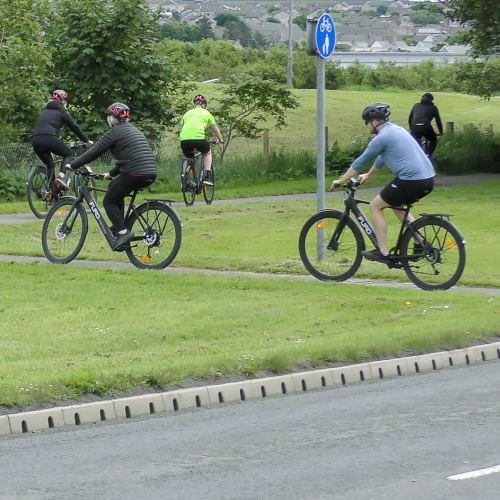 Cyclists on the e-bikes