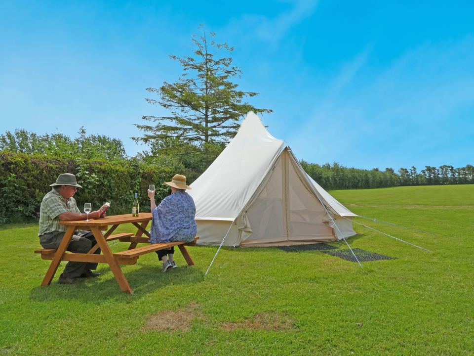 Bell tent with picnic bench