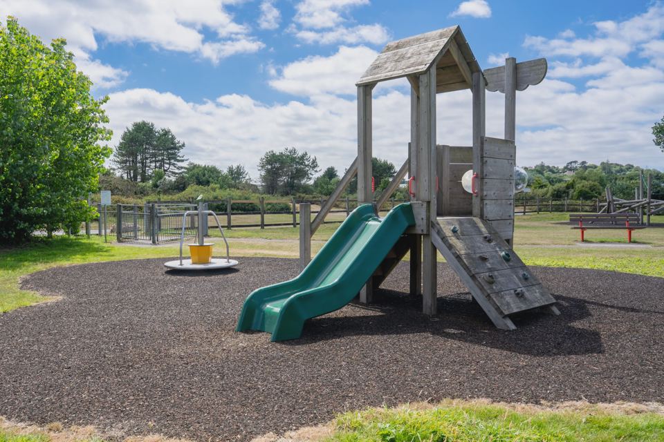 Play area with slide