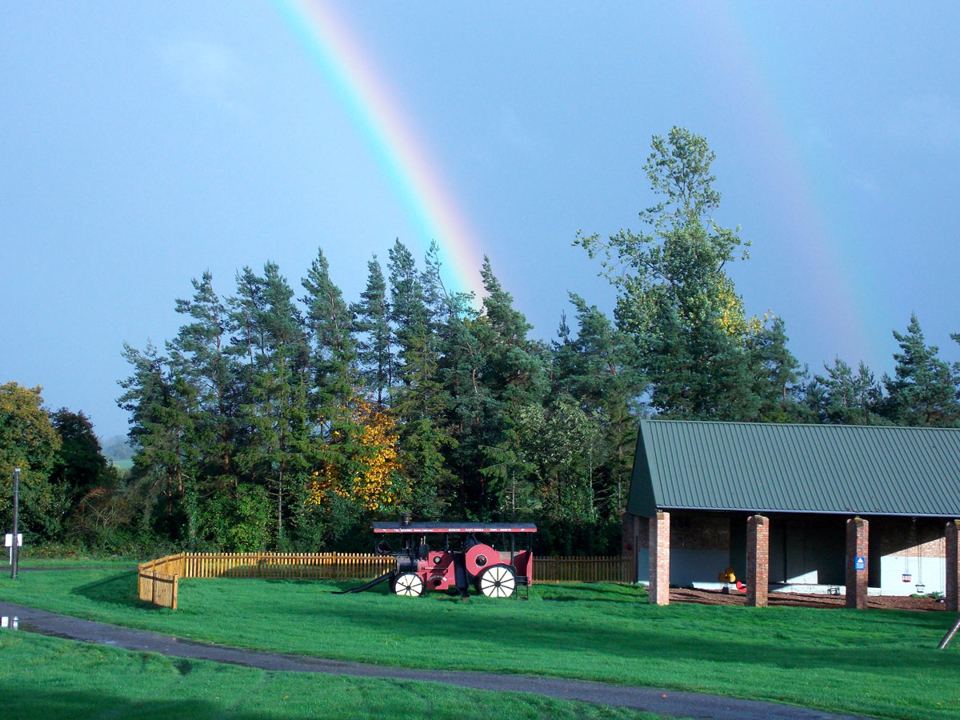 Covered area and tractor