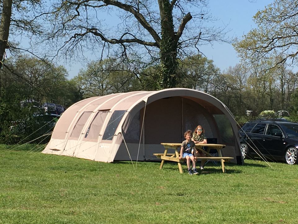 Large tent with picnic table