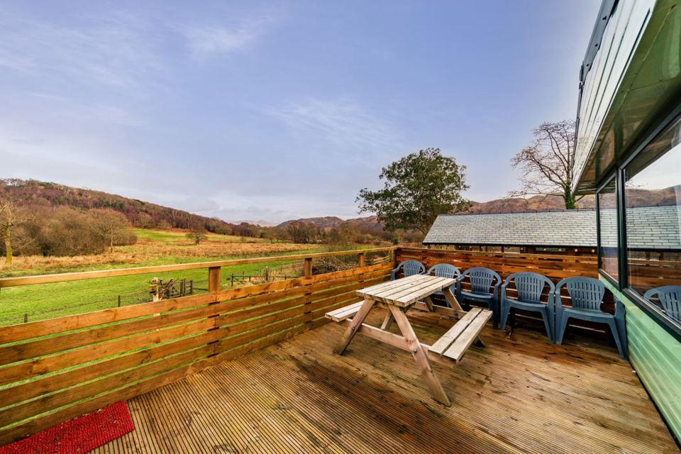 Decking with picnic table and hills