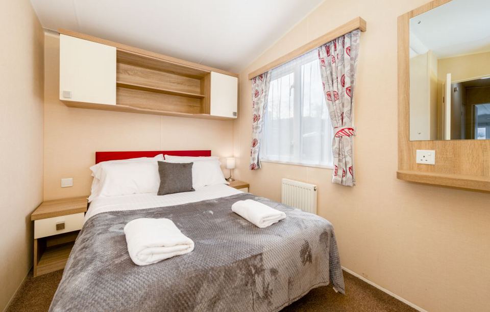 Caravan bedroom with double bed