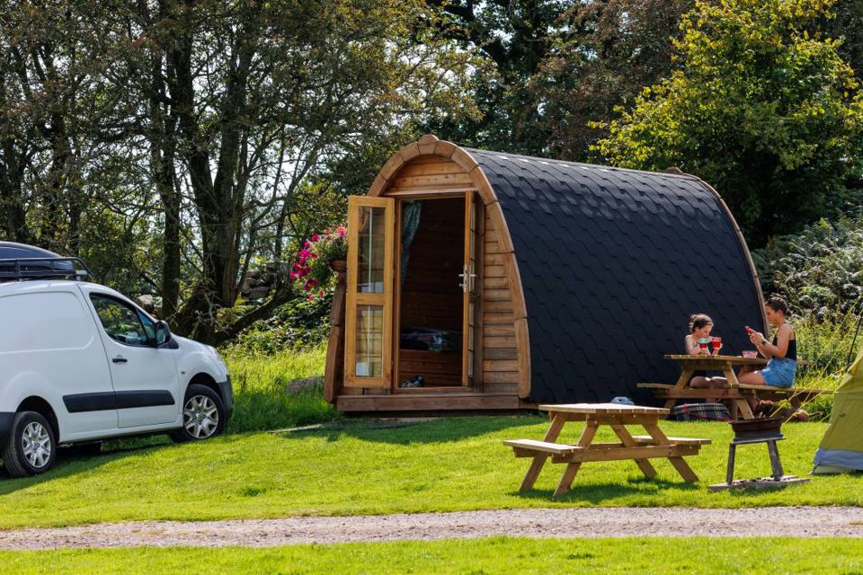 Pod with picnic table and van