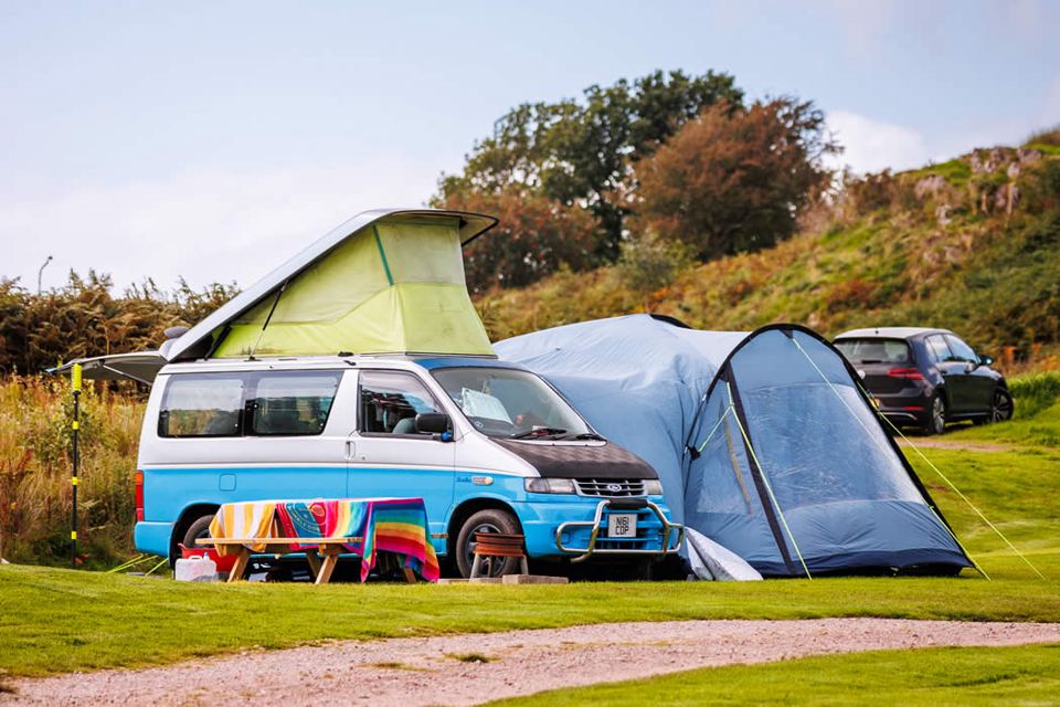 Campervan and tent on the pitch