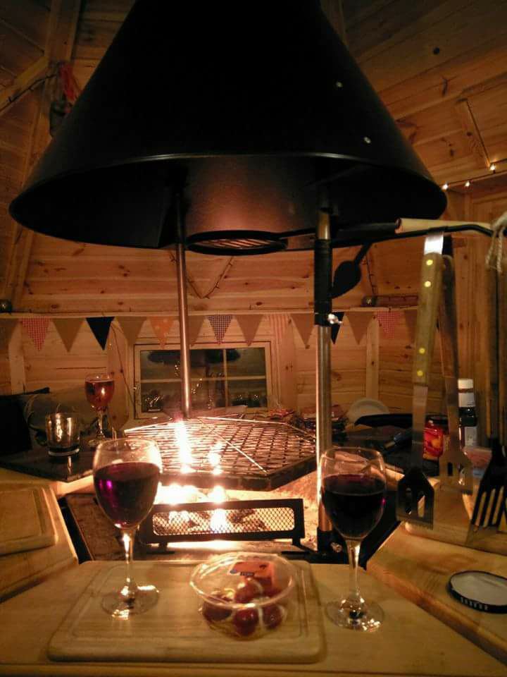 Inside a lodge with a stove