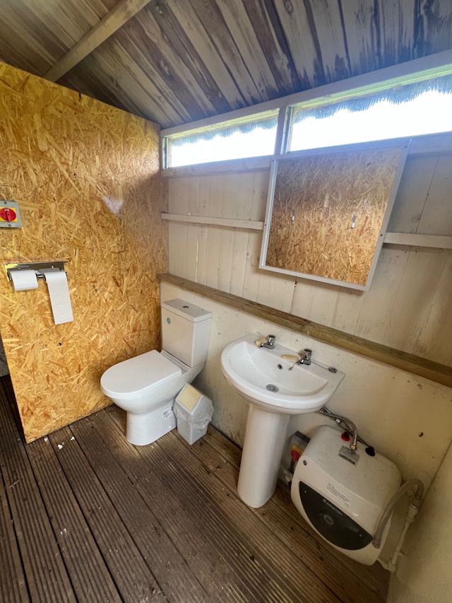 Toilet with sink and hot water