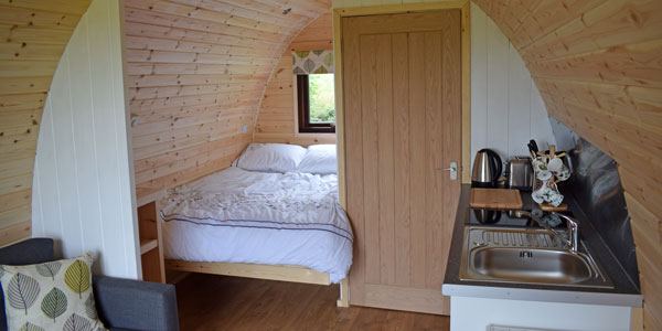 Double bed inside a pod
