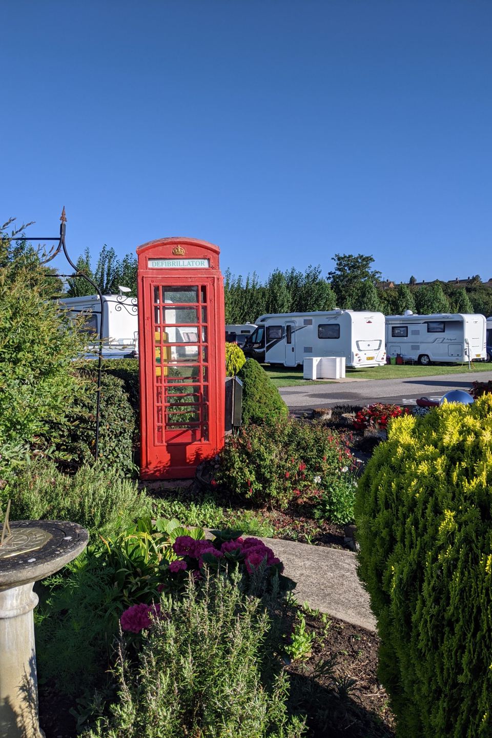 Motorhomes beyond the garden