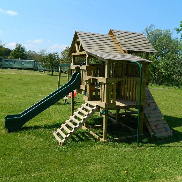 Climbing frame and slide