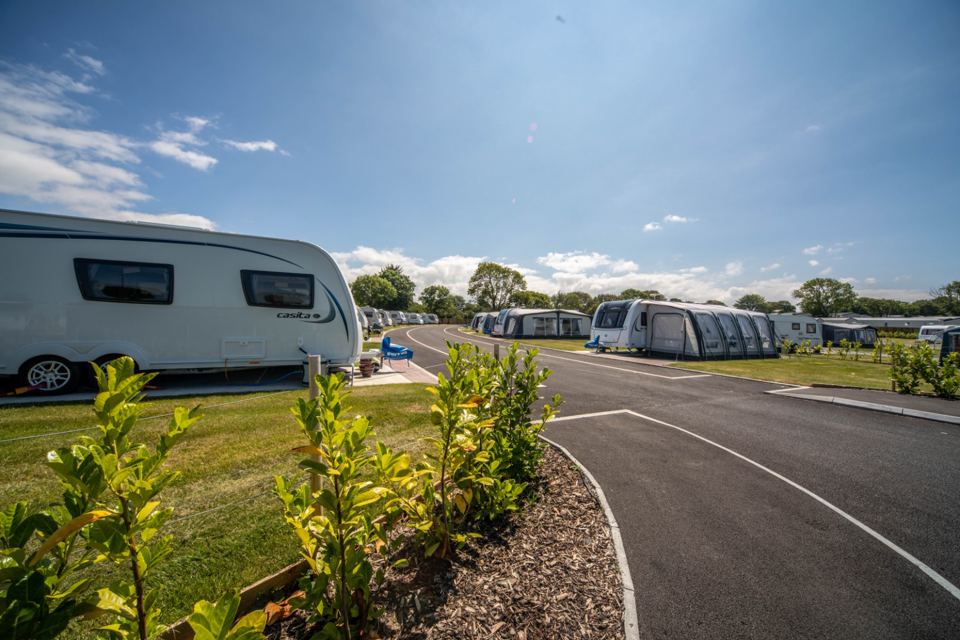 Tourer pitches beside the road
