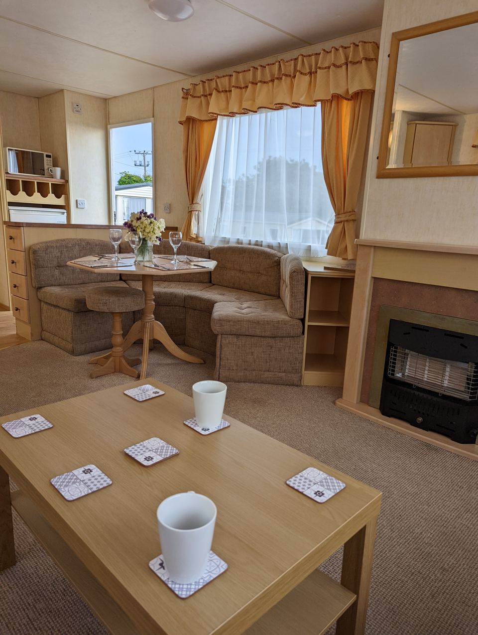 Living area with table and fire