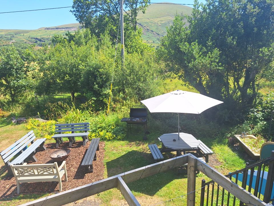 Fire pit and seating by the garden