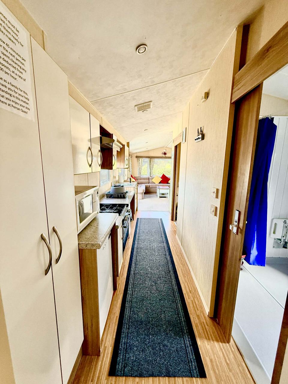 Narrow kitchen along the hall