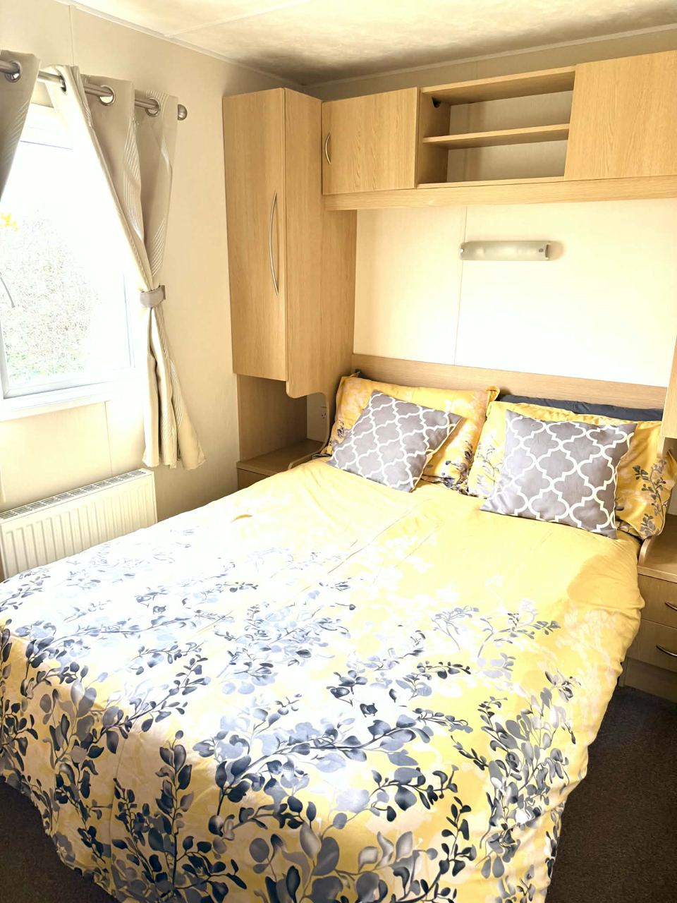 Double bedroom with floral duvet