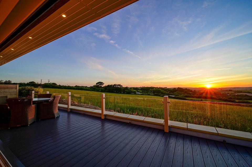 Decking at sunset over the fields