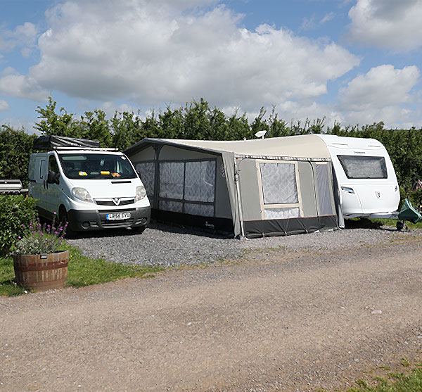 Caravan and awning on gravel