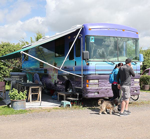 Converted bus on a hardstanding