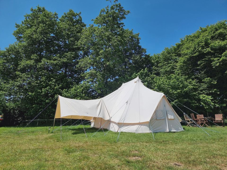 Large bell tent on grass