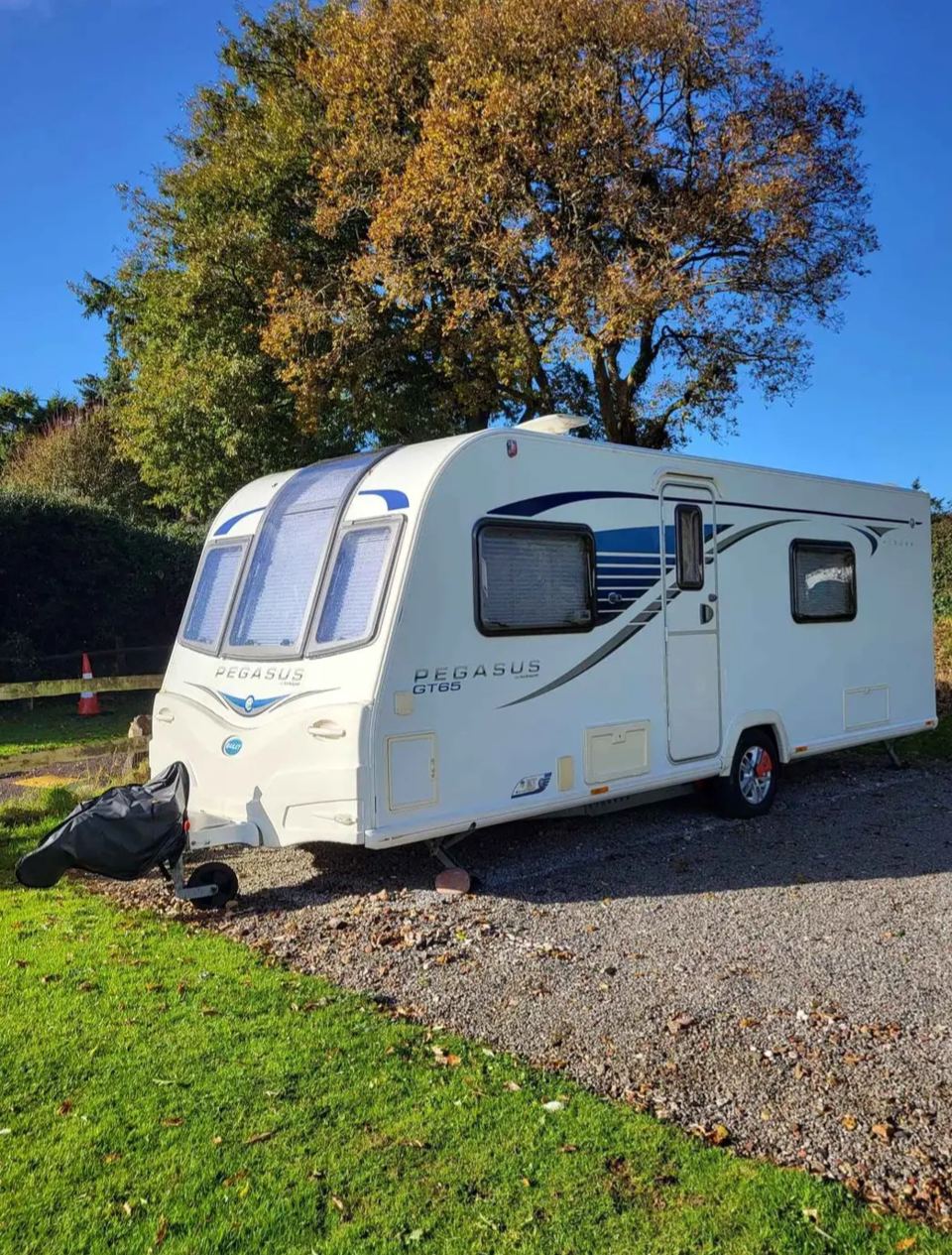 Caravan on the gravel pitch