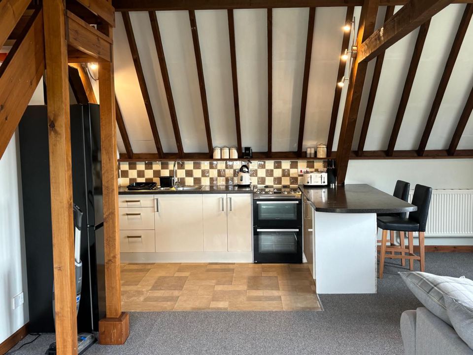 Open kitchen in the barn-style lodge