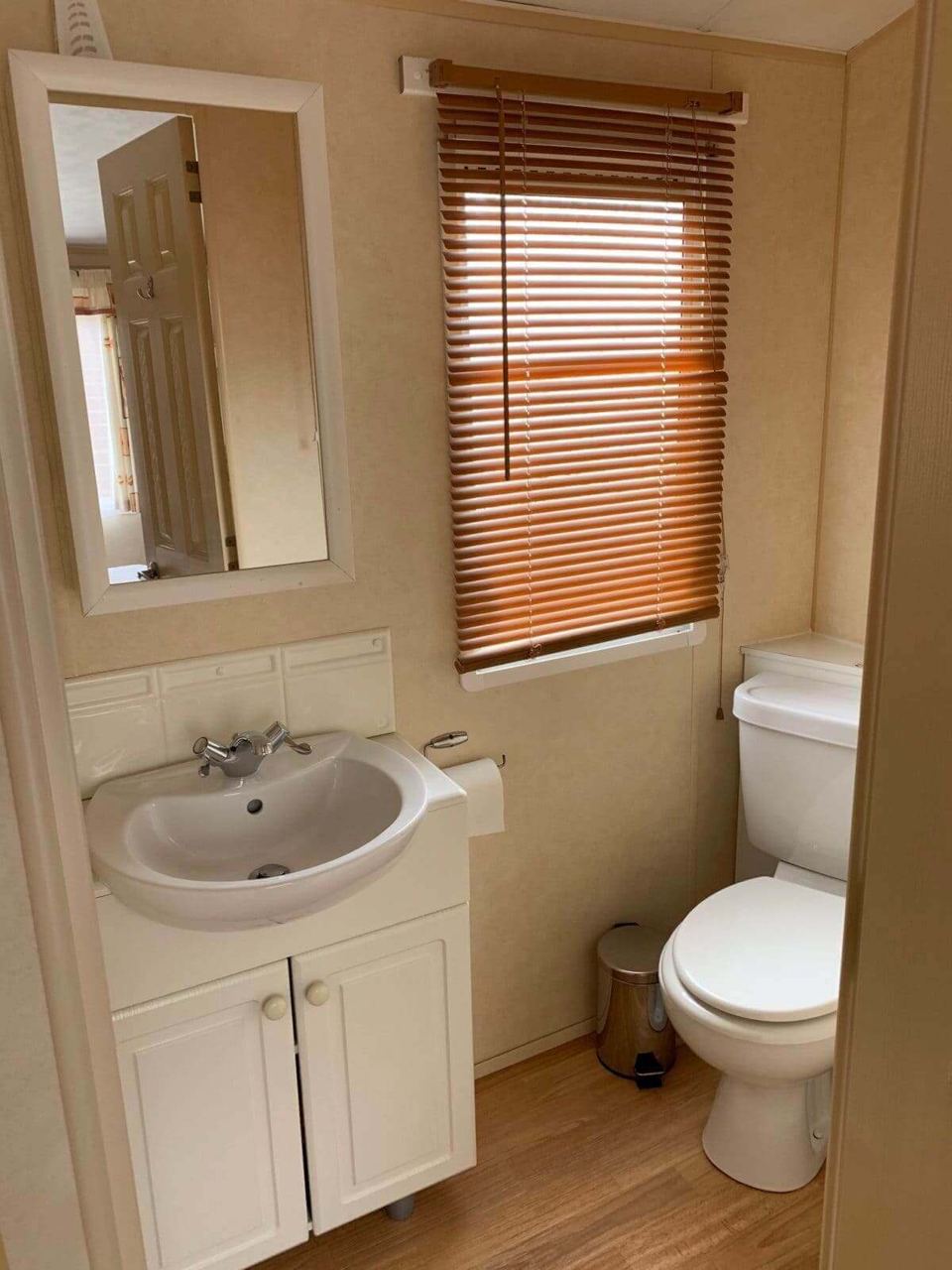 Bathroom with basin and toilet