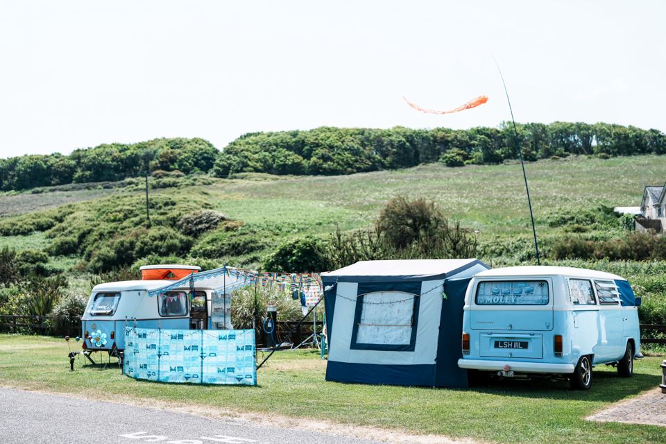 Campervans and tent on the pitches