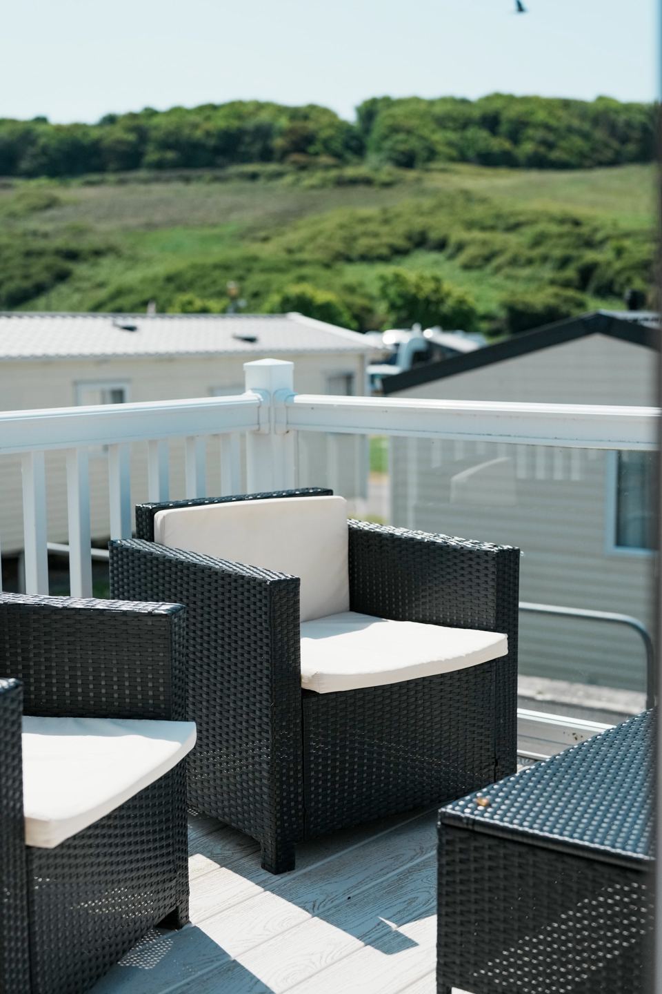 Decking with wicker chairs