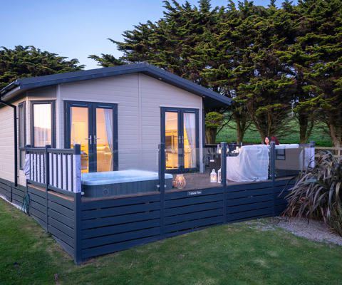 Lodge with hot tub on the decking