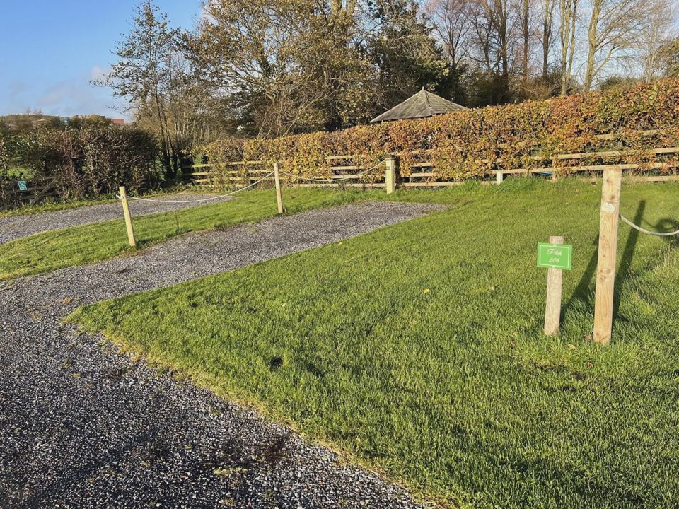 Gravel track beside the hedge