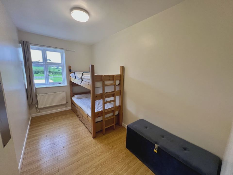 Bunk beds in the farmhouse room
