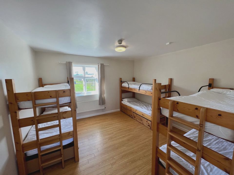 Bunk room with window
