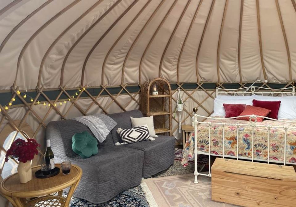 Yurt sitting area and bed